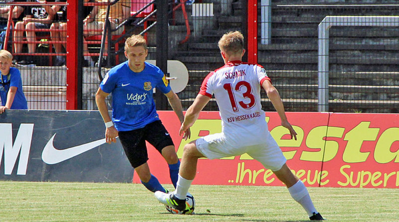 Mario Müller setzt sich gegen Sergej Schmik durch (Foto: Hell)
